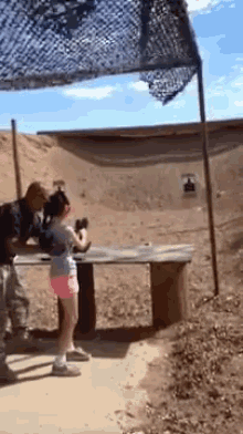 Moments Before A Girl Accidentally Kills Her Instructor With An Uzi. GIF - Uzi GIFs