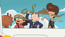 a group of cartoon characters with snakes on their heads