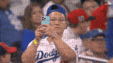 a dodgers fan takes a picture of himself