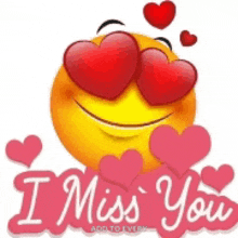 a smiley face with red hearts in his eyes and the words i miss you