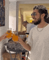 a man wearing sunglasses and a pearl necklace is toasting with a glass of orange juice
