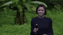 Laura Taylor Smile GIF - Laura Taylor Smile Open Bottle GIFs