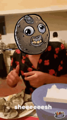a man with a cartoon face on his head giving a thumbs up and the word sheeeeesh below him