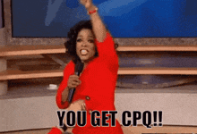 oprah winfrey is holding a microphone and saying you get cpq