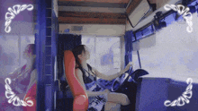 a woman is sitting in a red chair in a bus with a neon sign around her that says sddg