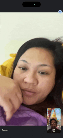 a woman and a man are on a video call with the name aaron at the bottom