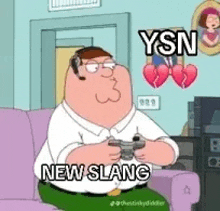 peter griffin is sitting on a couch holding a video game controller .