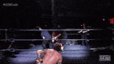 a wrestling match is being broadcasted on the gcw code channel