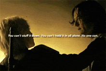 a man and a woman are hugging with the words " you can 't stuff it down " on the bottom