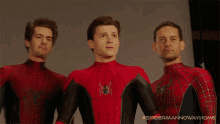 posing for a picture spider man peter parker tom holland andrew garfield