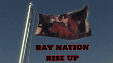 a flag with a picture of a man on it that says ray nation rise up