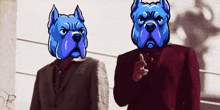 a man in a suit stands next to another man with blue dogs on their faces