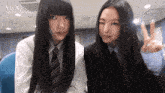 two girls with long black hair are posing for a picture with vlog meow myself 6