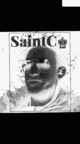 a black and white photo of a man wearing sunglasses and the words saint c