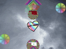a rainbow heart with the words gay pride written on it