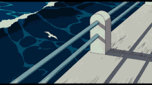 a seagull is flying over a body of water behind a railing