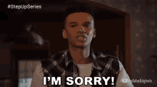 a man in a plaid shirt is saying i 'm sorry on youtube