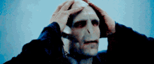 Voldemort Returns Face GIF - Voldemort Returns Face Touching GIFs