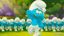 a group of smurfs are dancing in a grassy field