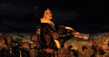 a man in a leather jacket is holding a very large gun