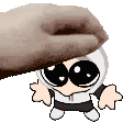 a cartoon character with big eyes is being propped up by a person 's hand .