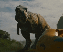 a t-rex dinosaur is standing in a field with trees