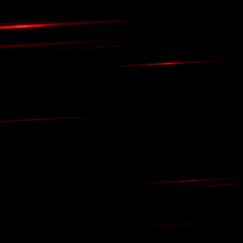 a red letter y is lit up on a dark background