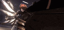 a girl with red hair is holding a sword in her hand .