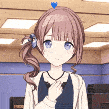 a girl with a blue heart on her head is wearing a white jacket