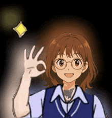 a girl with glasses is giving an ok sign with her hand