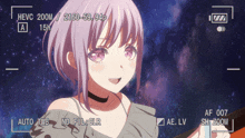 a video of a girl with purple hair is being recorded