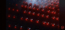 a close up of a circle with red dots on it and a circle with the number 12 on it