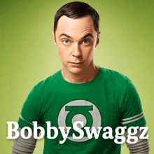 a man wearing a green shirt with the word bobby swaggz written on it