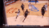 a basketball game is being played in a staples center