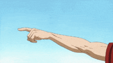 a person 's arm is pointing to the sky with their finger