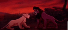 a purple lion and a white lion are standing next to each other in a field .