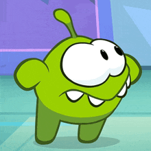 a green cartoon character with white teeth and a long tail