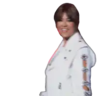 a woman wearing a white jacket with holes in the sleeves is smiling