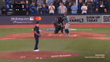 a baseball game is being shown on a tv screen