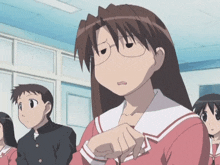 a girl with glasses is making a funny face in a classroom