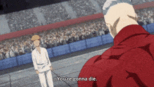 a man in a red shirt says " you 're gonna die " to a man in a white karate uniform
