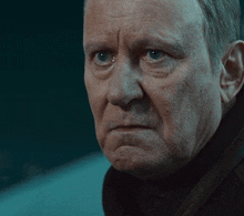 a man with a sad look on his face