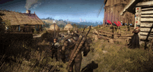 a man with a sword is walking in a field with a woman
