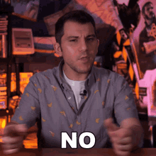 a man wearing a banana shirt says no