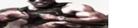a blurry picture of a man wearing sunglasses and a watch is sitting on a couch .