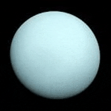 a close up of a blue ball on a black background
