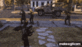 a group of spiders are walking down a sidewalk in front of a house ..