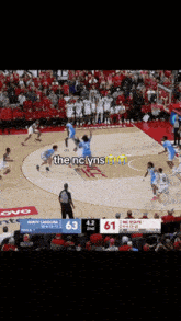 a basketball game between north carolina and nc state with the score at 61 to 63