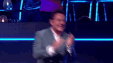 clapping gerard joling the masked singer happy excited