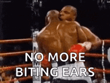 two boxers are kissing in a boxing ring with the words `` no more biting ears '' written on the bottom .